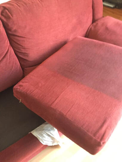 a red couch being cleaned at a tempe customers home